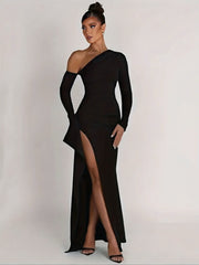 Black one-shoulder maxi dress with deep side split, ruffle detail, and detachable sleeve, crafted from crepe fabric.