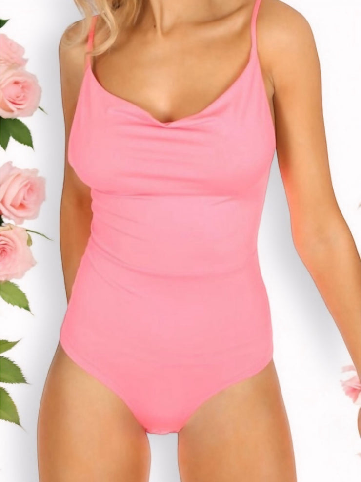 Neon pink slinky bodysuit for women featuring a cowl neck, adjustable straps, low-back design, and stretchy, figure-hugging fabric. Perfect for stylish women's fashion and bold outfit choices.