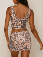 Savage Glam Two-Piece Set in Leopard Print with Sleeveless Crop Top and Mini Skirt, Sequin Party Outfit for Women