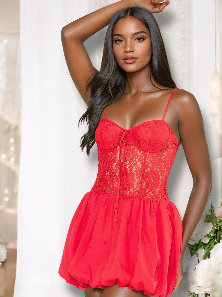  A vibrant red puff ball mini dress featuring a lace bodice with underwire and padded cups, a sweetheart neckline, thin adjustable straps, and a playful puffball skirt with a tie-up detail at the front.